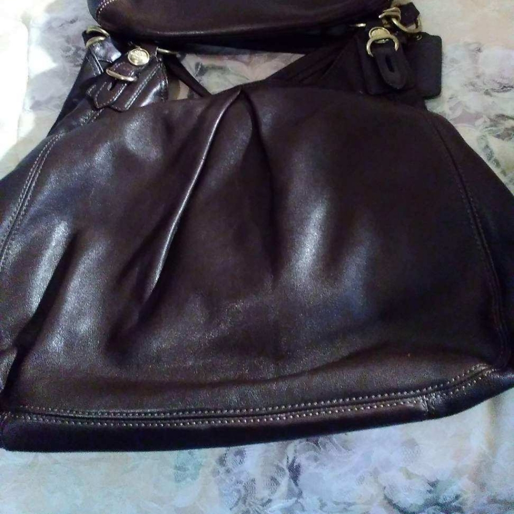 Chocolate brown leather Coach handbags..small is $60... Larger 1 is $80